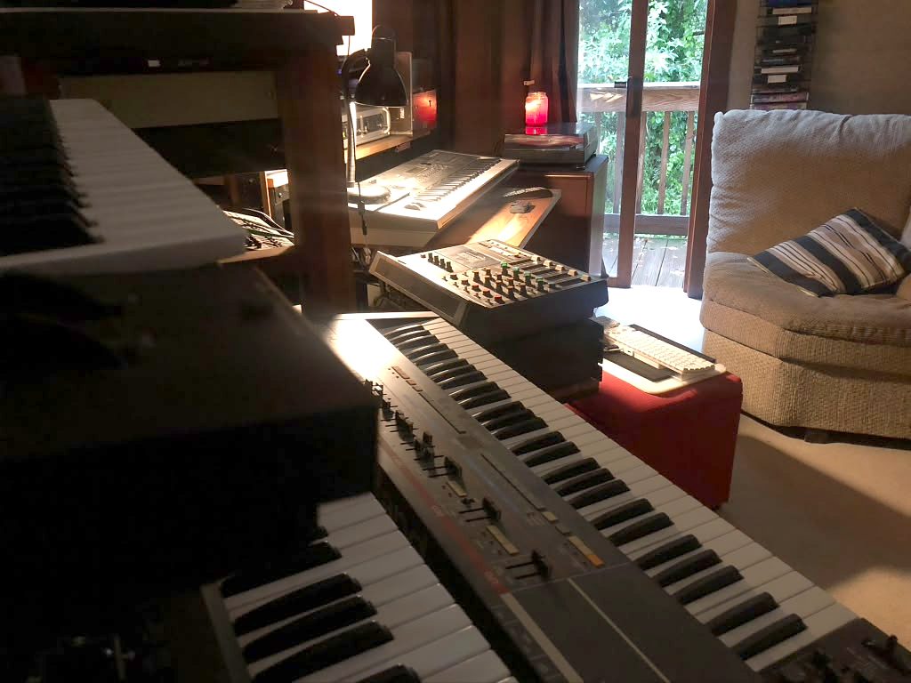 Stack of vintage keyboards and synthesizers